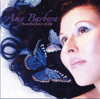 Featured Artist - Amy Barbera - Check Out Amy's original song 'Make Me A Butterfly' & the epic dance remix of 'Make Me A Butterfly' as well! Her song 'Make Me A Butterfly' is featured on Amy's debut album 'Beautiful Flower of Life' that was released in 2008. She is currently working on her 2nd album which will be titled 'Paint Me A Rainbow' and Amy hope's to have it released by early 2012. Also check out Amy's new dance song 'Paint Me A Rainbow' & the Dance remix of my song 'Electric Church' too. Search the playlist under 'A' and click it to play it. The Music You Want is on Radio WHAT at http://www.radioWHAT.com/.