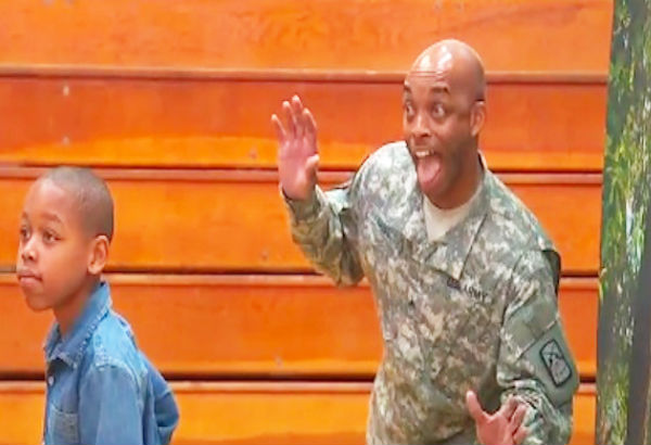 Soldier Surprises Son With Photobomb During School Picture Day [Video]