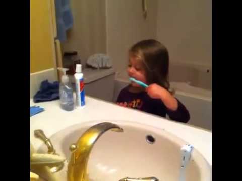 VINE: Dad Teaches Daughter An Important Lesson, while brushing her teeth!