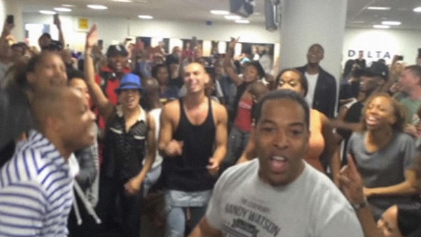 WATCH: That Time The 'Aladdin' & 'The Lion King' Broadway Casts Had An Airport Sing-Off